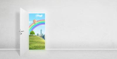 puerta a un mundo mejor. el concepto de un portal a la realidad virtual, metaverso. una ciudad inteligente en el fondo con un arco iris, un globo y una naturaleza preservada. copie el espacio al lado de la pared blanca foto