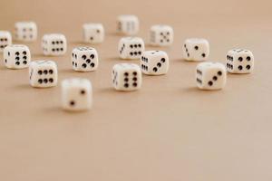 Set of gaming dice with copy space on brown background. Concept for games, game board, role playing game, risk, chance, good luck or gambling. Toned image top view. Close-up photo