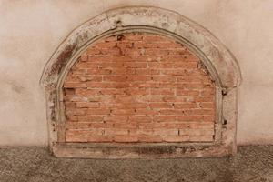 Old bricked up window photo