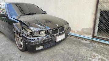 BANGKOK, THAILAND - May 20, 2022 BMW car accident Broken headlights and bumpers photo