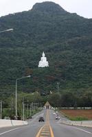 The viewpoint in front of the White Buddha is in the middle of a green forest hill. Wat Phra Khao at Nakhon Ratchasima, Thailand, on 16-05-2022 photo