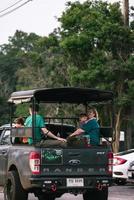 people driving on the road In the beautiful natural forest on both sides of the road On Khao Yai National Park in Thailand 16-05-2022 photo