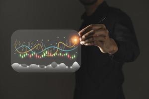 businessman analyzing sales data and economic growth graph chart, e-commerce and network, business strategy. photo