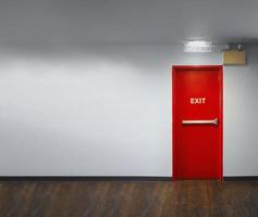 Fire exit door. Fire exit emergency door red color metal material photo