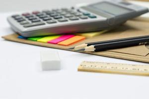 pencil ruler eraser colors note, book, calculator, selective focus pencil concept education school equipment photo