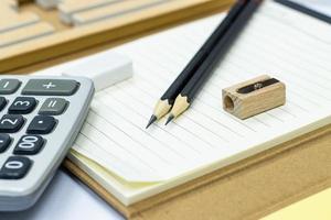 pencil eraser book caculator, selective focus pencil concept education school equipment photo