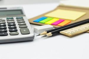 pencil ruler eraser colors note, book, calculator, selective focus pencil concept education school equipment photo