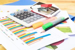 pencil, paper sheeet, calculator ,graph sheet, Color highlight pen concept Office equipment photo