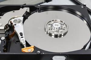 Hard disk drive for computer concept Working data storage read write photo