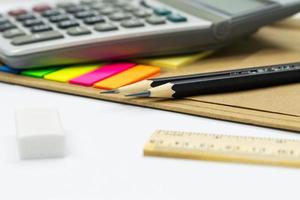 pencil ruler eraser colors note, book, calculator, selective focus pencil concept education school equipment photo