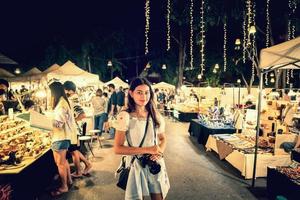 Prachuap Khiri Khan, Thailand - Jan 31 2021 happy asian woman in night market in Huahin photo