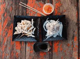 fresh and grilled squid with sauce photo