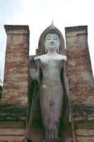 The big buddha statue attitude of persuading the relatives not to quarrel, Thailand. photo