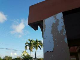 house with chipped and peeling paint in Puerto Rico photo