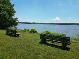 bench overlooking the Potomac river photo