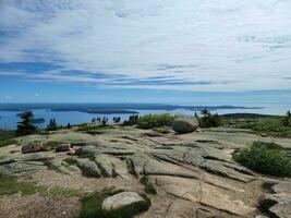 granite rocks and trees view from Cadillac mountain in Maine photo