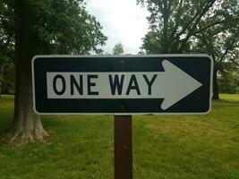 black and white one way sign photo