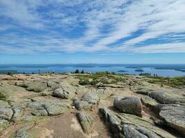 granite rocks and trees view from Cadillac mountain in Maine photo