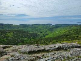 granite rocks and trees view from Cadillac mountain in Maine photo