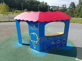 blue ice cream stand on playground photo