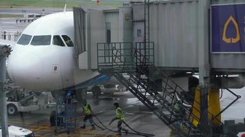Technical staff preparing the plane for takeoff video