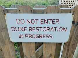 no ingrese la restauración de dunas en signo de proceso foto