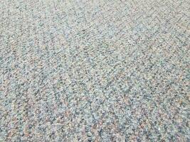 blue and red carpet fibers up close photo