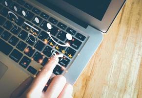 Concept of customer's satisfaction and service, businesswoman using laptop to express their opinions, answers and satisfied scores. photo
