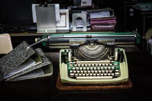 Vintage typewriter and old file photo