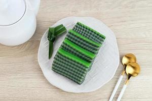 Kue Lapis Pandan or Kue Pepe or sticky layer cake, Indonesian traditional snack made from rice flour photo