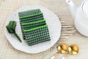 Kue Lapis Pandan or Kue Pepe or sticky layer cake, Indonesian traditional snack made from rice flour photo