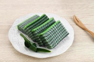 Kue Lapis Pandan or Kue Pepe or sticky layer cake, Indonesian traditional snack made from rice flour photo
