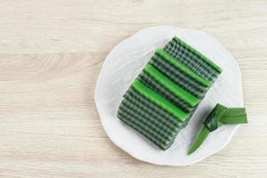 Kue Lapis Pandan or Kue Pepe or sticky layer cake, Indonesian traditional snack made from rice flour photo