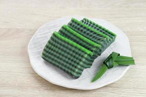 Kue Lapis Pandan or Kue Pepe or sticky layer cake, Indonesian traditional snack made from rice flour photo