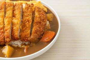 curry rice with fried pork cutlet and creamy omelet photo