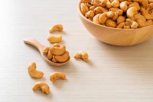 Cashew nuts in wooden bowl photo