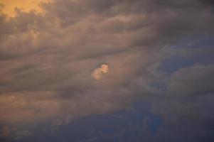 Sunset and Stormy clouds photo
