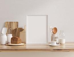 Mock up poster frame in kitchen interior with white wall on wood shelf. photo