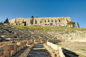 Ancient theater in a summer day in Acropolis Greece, Athnes photo