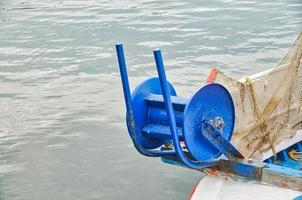 Fishing boat in the sea photo