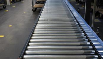 Conveyor belt inside a warehouse photo