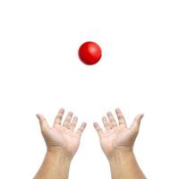 Hand holding snooker ball on white background photo