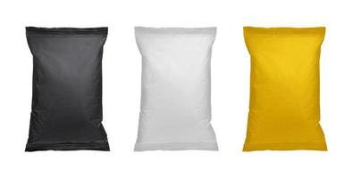 White, black and yellow pillow bag of chips, snacks or candys. Top view. Isolated on white background photo