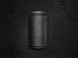 Can of cold beverage on a black leather background photo