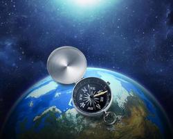 Compass nestled on blue earth in space colorful solar system. . Travel destination and navigation concept around the world photo