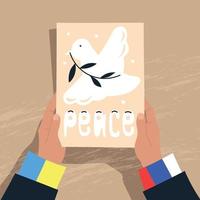 Peace between Russia and Ukraine. Hands hold a leaf with the image of a dove of peace. Vector image.