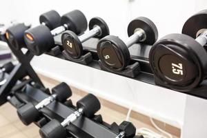 Different weight dumbbells. Sports Equipment photo