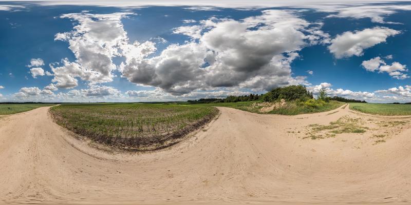 full 360 degree seamless panorama in equirectangular spherical equidistant projection. Panorama view  on the road with beautiful day and awesome clouds. Background for virtual reality content