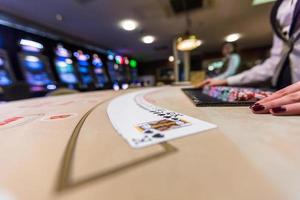 gambling chips and cards on a game table roulette photo