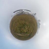 Little planet.  Spherical view of abandoned old plane in the fog photo